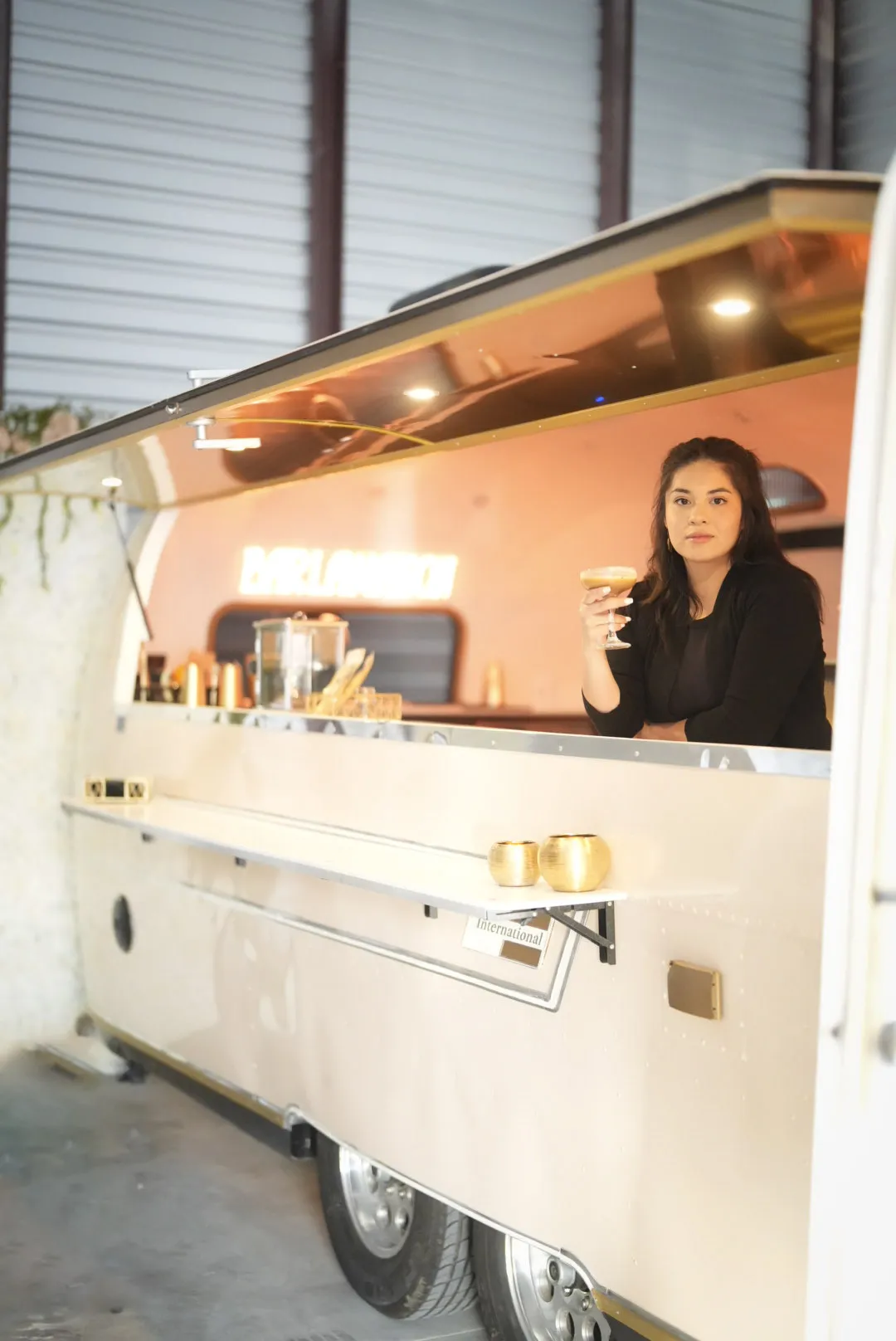 a mobile bar from bar la maison in an indoor setting