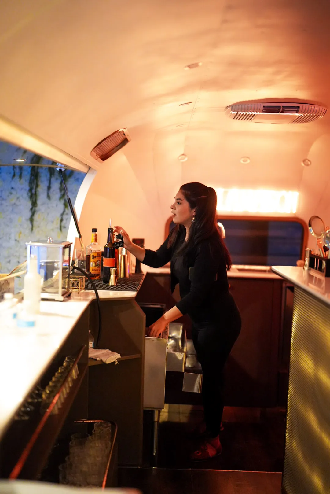 a bartender in a mobile bar 